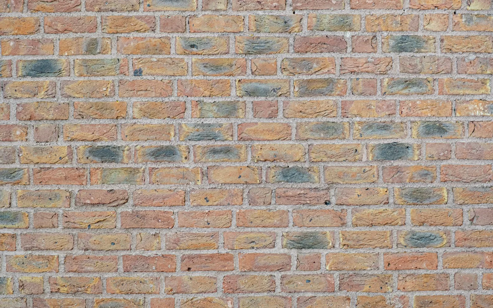Façade en pierre rénovée après un chantier de ravalement et d'enduit